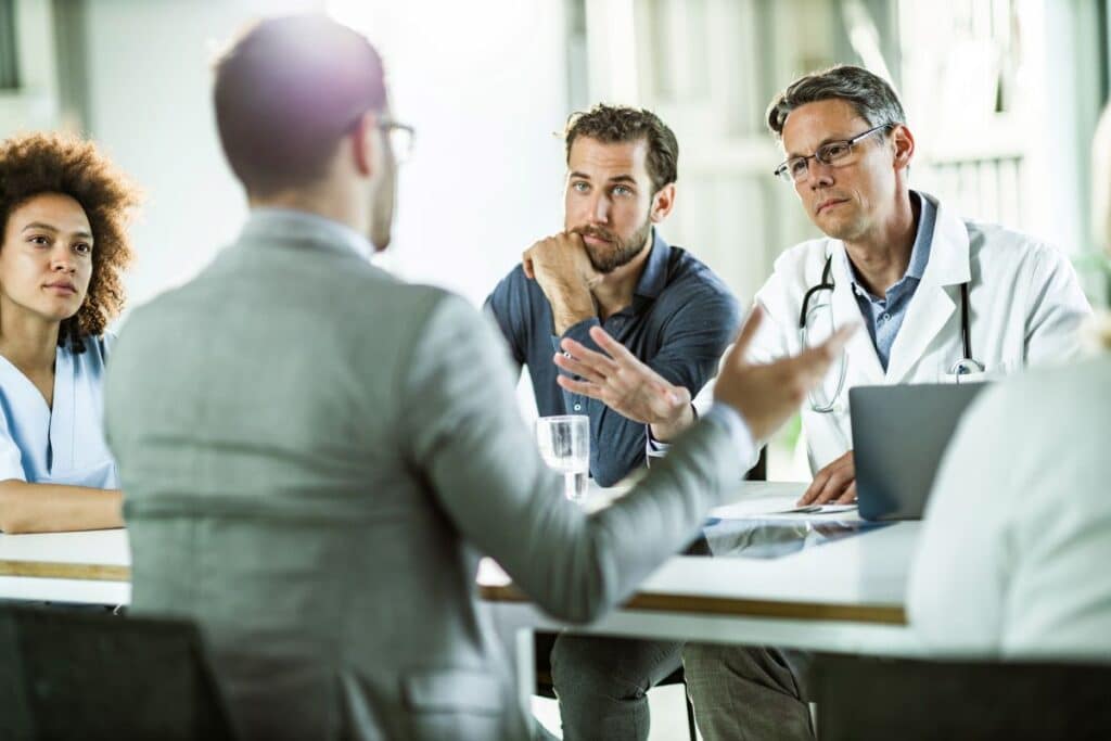 doctors interviewing candidate