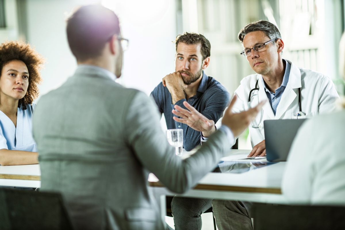 doctors interviewing candidate